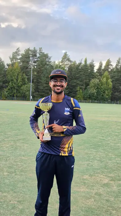 A moment with the trophy at the ground